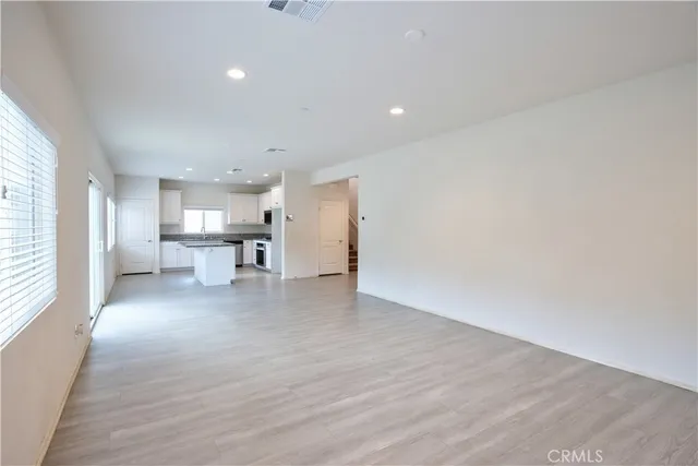 a bathroom with a double vanity sink mirror and shower