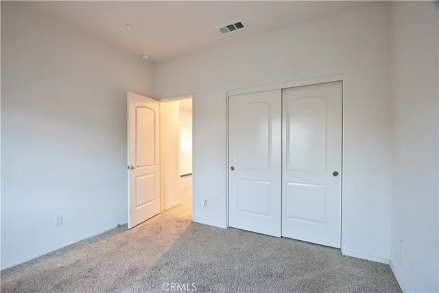 a front view of a house with yard