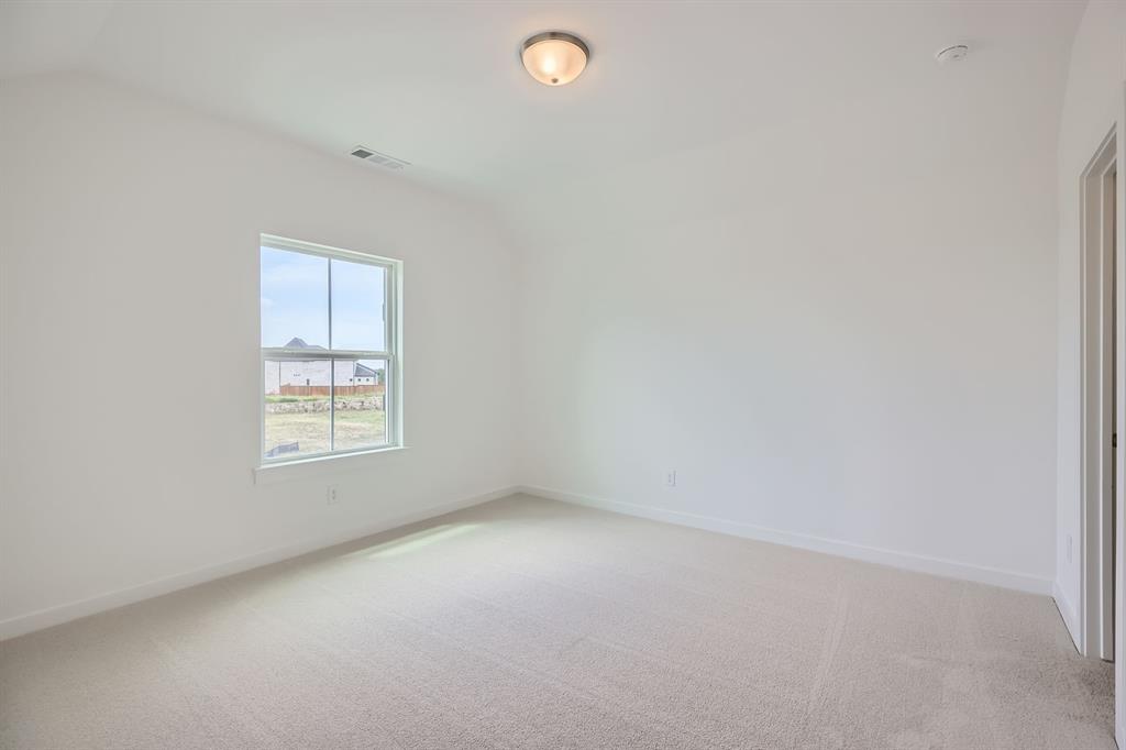 2620 Cedar Rdg Road Celina, TX 75009 - Photo 18 of 27 Spare room with light carpet and baseboards