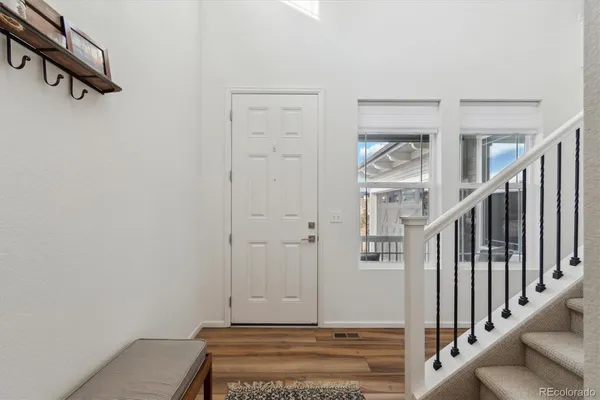 a view of a hallway with staircase