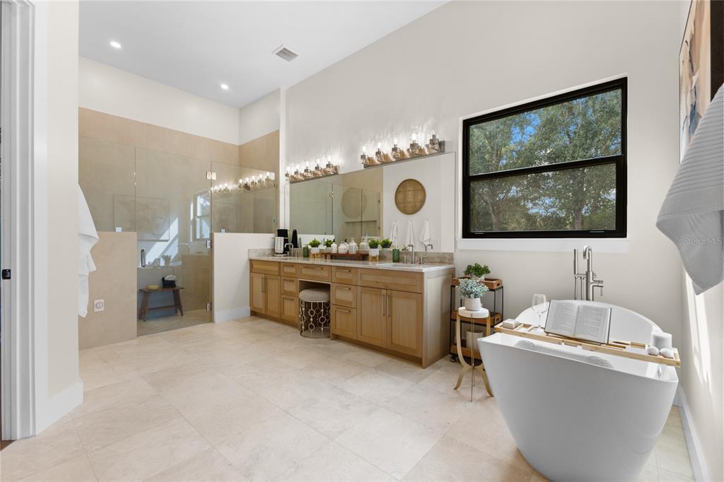 4940 Wauchula Road Myakka City, FL 34251 - Photo 28 of 77 a room with a couch and a painting on the wall