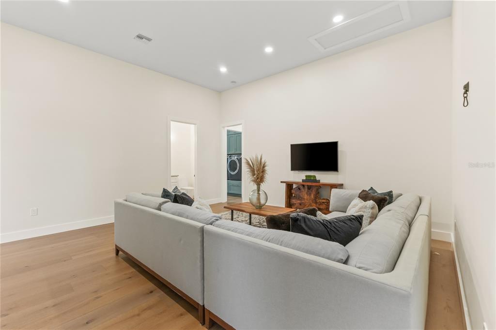 4940 Wauchula Road Myakka City, FL 34251 - Photo 35 of 77 a living room with furniture and a flat screen tv