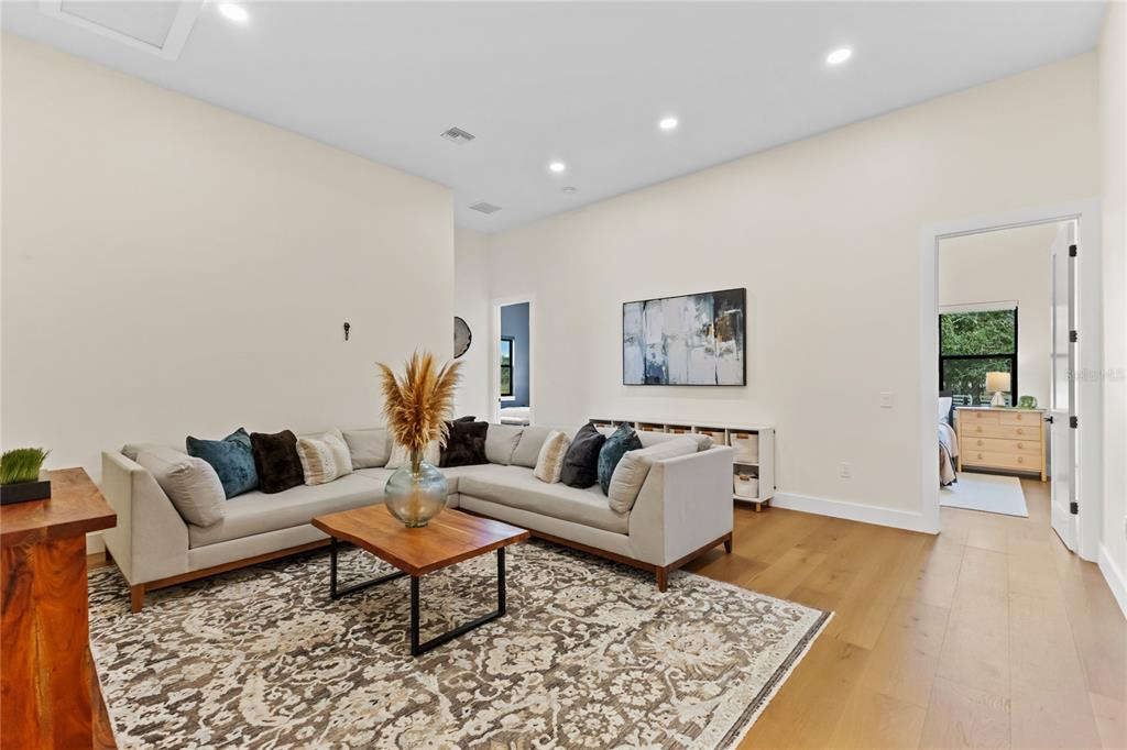 4940 Wauchula Road Myakka City, FL 34251 - Photo 43 of 77 a living room with furniture and wooden floor