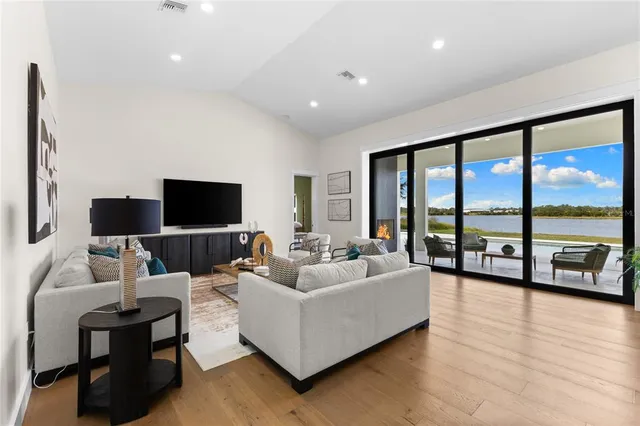 a view of a kitchen with granite countertop cabinets