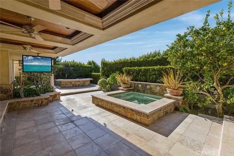 a view of a chairs and table in the patio