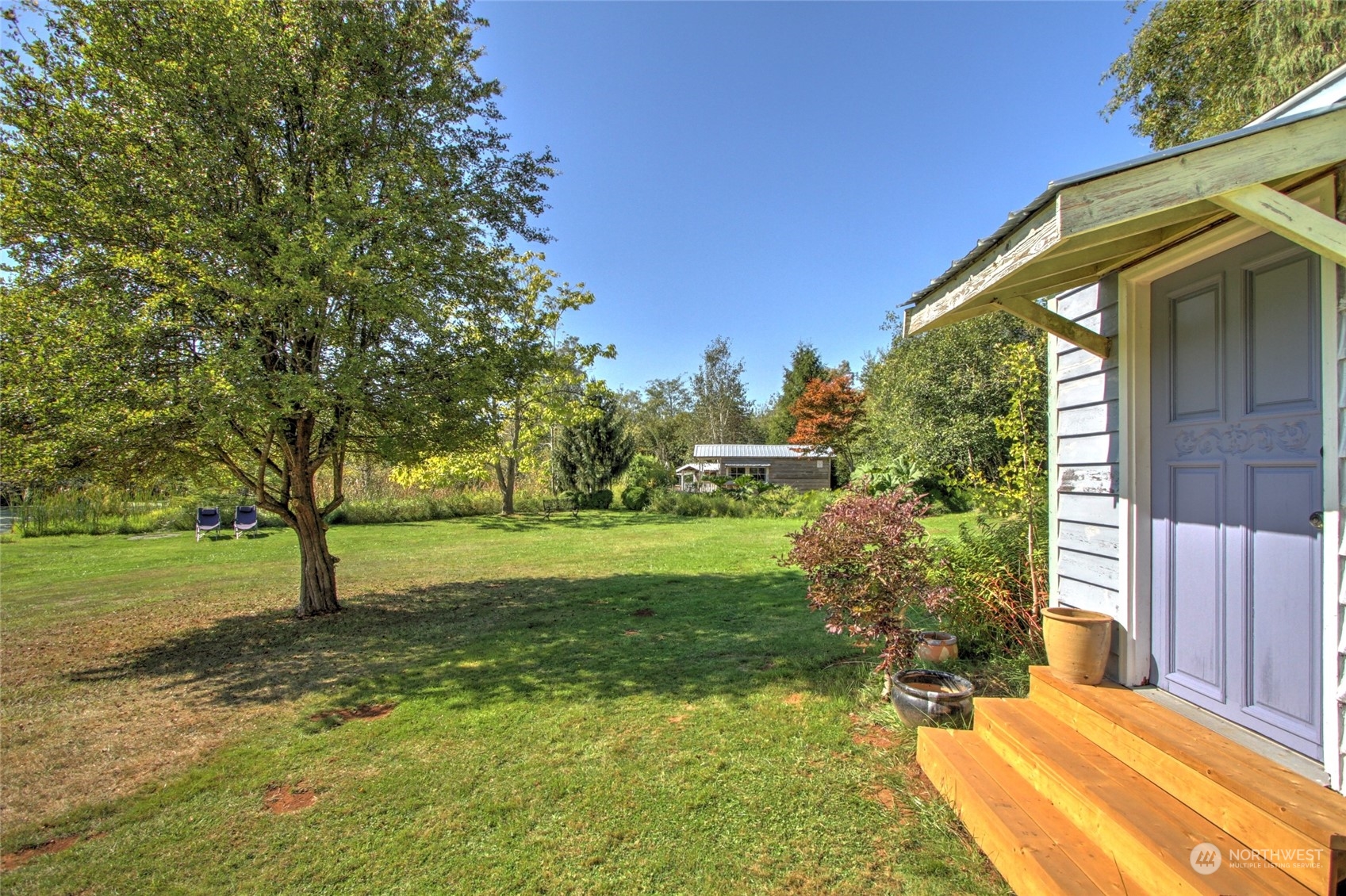 8141 Percie Road Custer, WA 98240 - Photo 13 of 22 a view of a backyard with a garden and plants