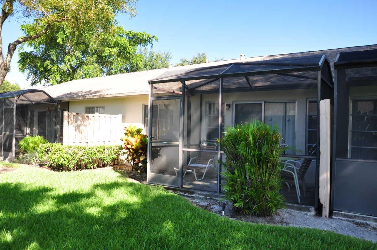 8602 Dreamside Lane Boca Raton, FL 33496 - Photo 18 of 25 REAR VIEW SCREENED PATIO