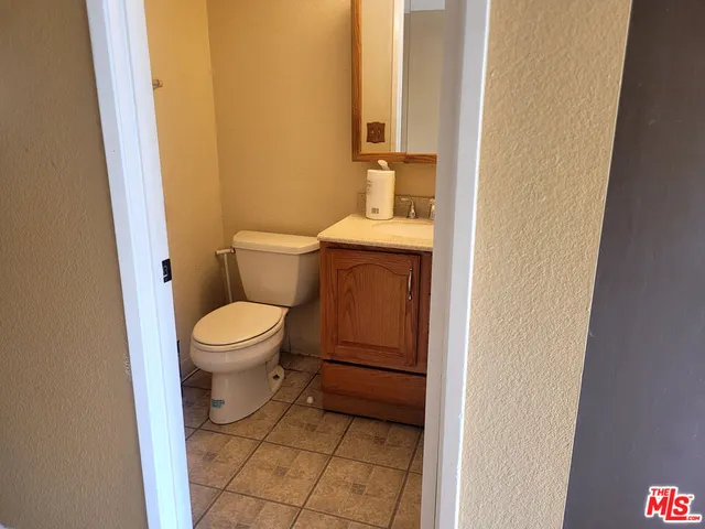 a bathroom with a toilet and a sink