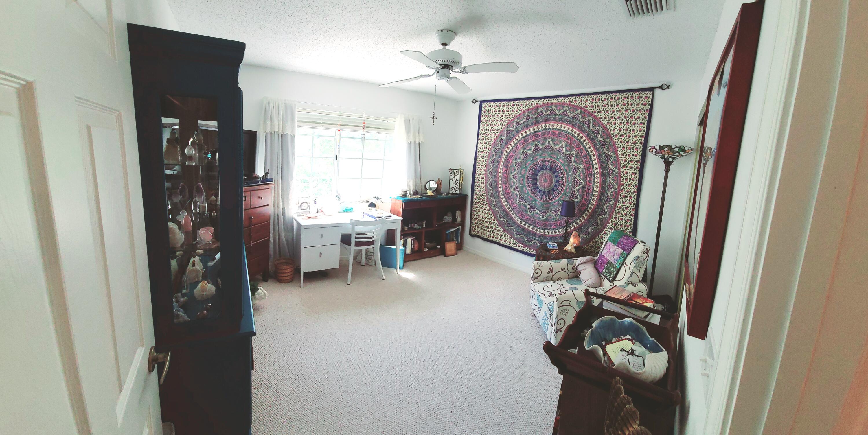 5121 Sabal Gardens Lane, Unit 2 Boca Raton, FL 33487 - Photo 20 of 25 a view of living room with furniture and a window