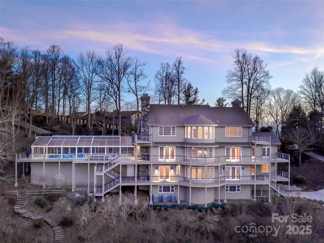 a view of a large building next to a lake