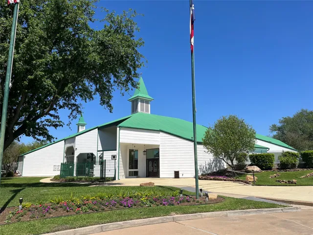 a view of swimming pool with a yard