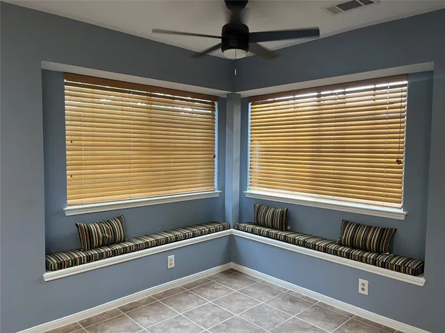 a bathroom with a bathtub and a sink