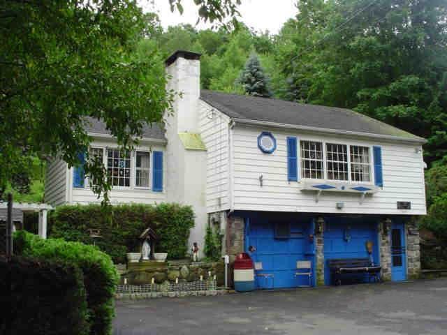 a view of house with outdoor space