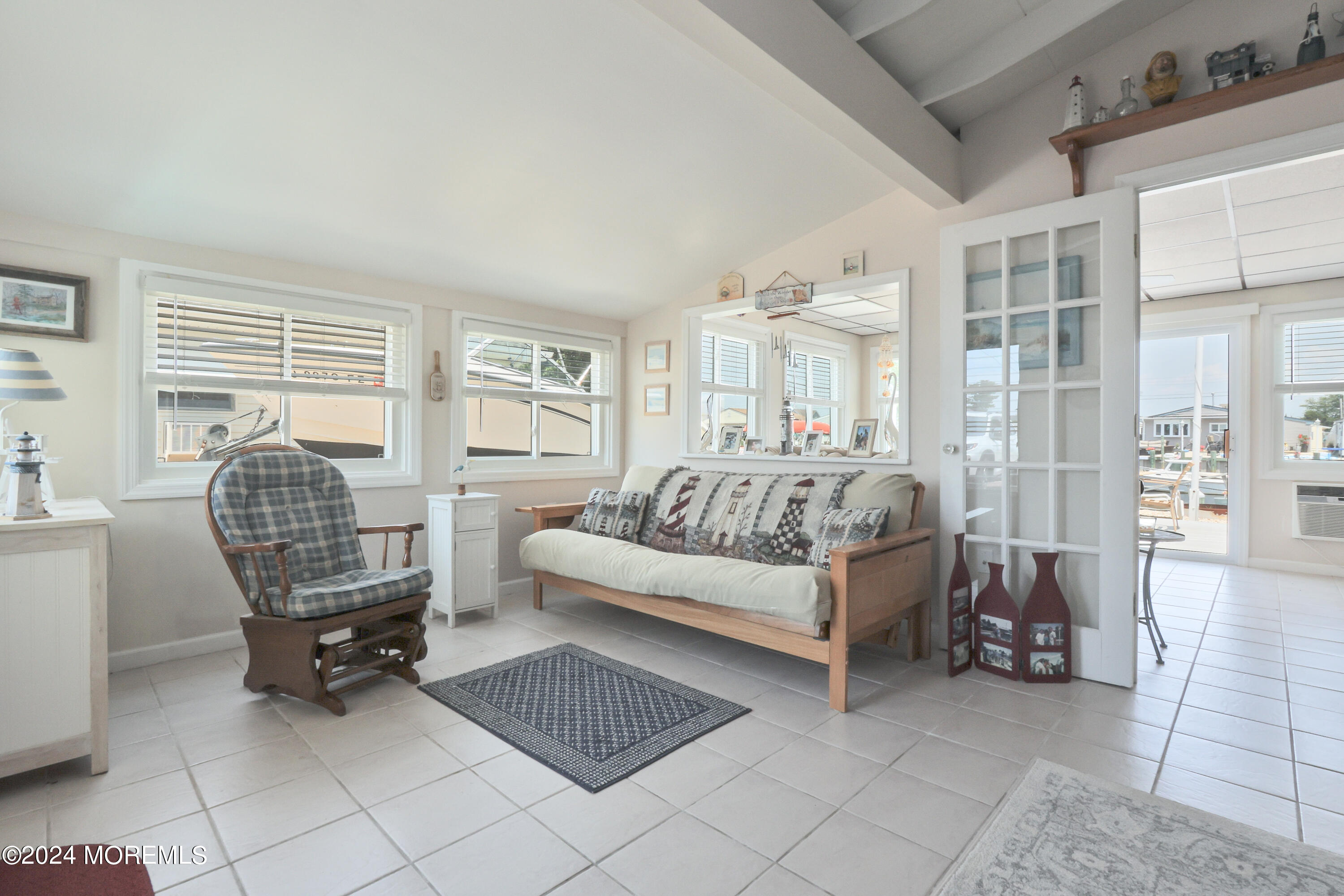 4 West Thames Road Little Egg Harbor, NJ 08087 - Photo 4 of 22 a living room with furniture and a large window