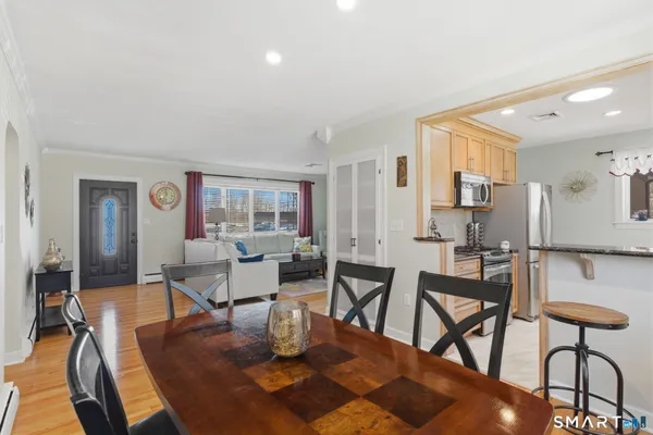 a view of a dining room with furniture