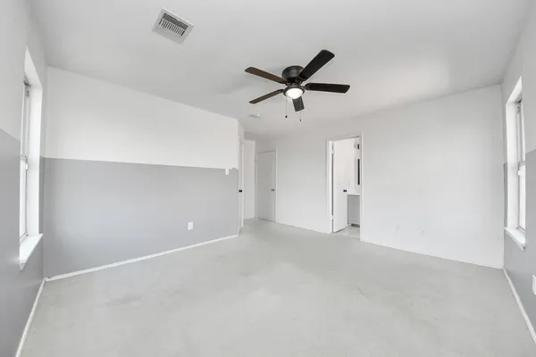 a bathroom with a toilet a sink and a bathtub