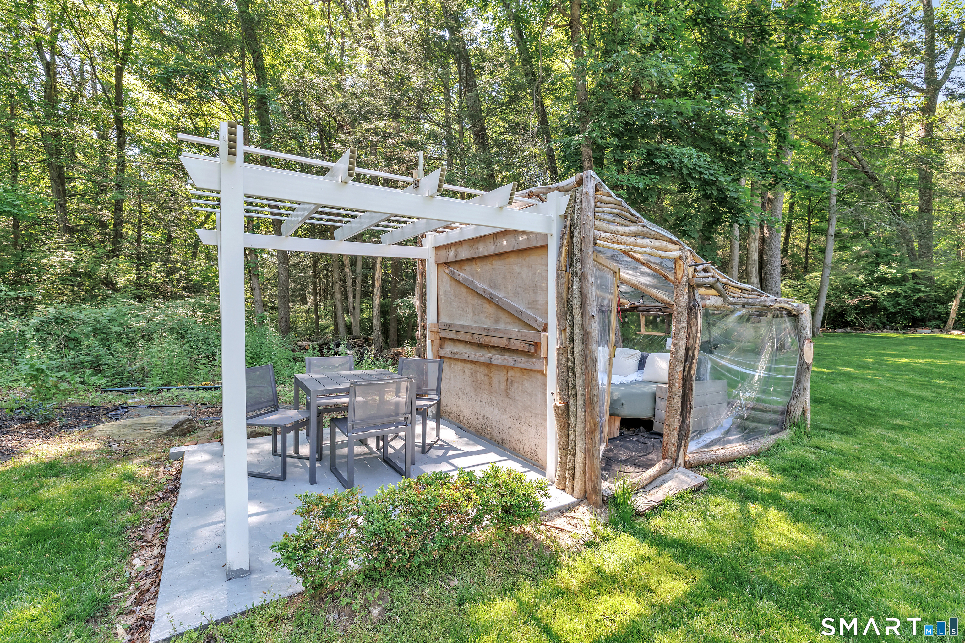 57 Olmstead Road Redding, CT 06896 - Photo 20 of 22 a view of a patio in backyard