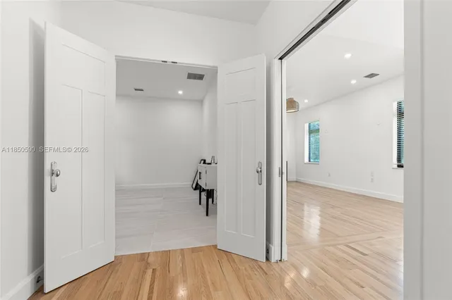 a view of entryway with wooden floor