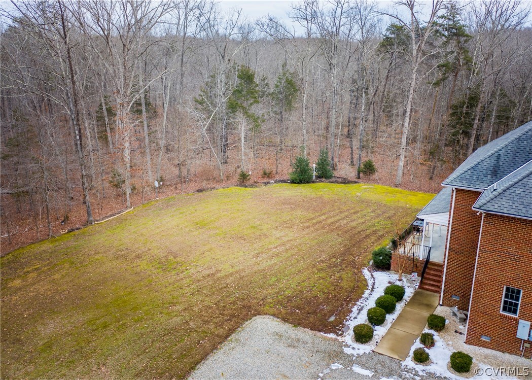 1886 Nichols Road Powhatan, VA 23139 - Photo 6 of 42 Manageable yard with mature hardwood trees.