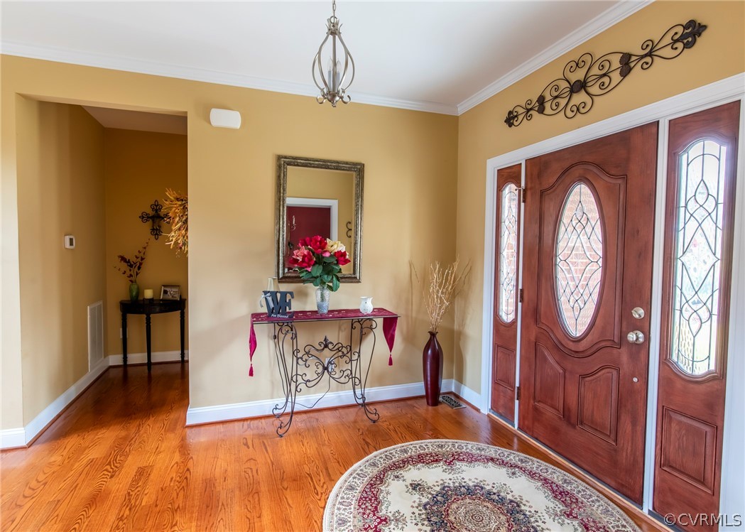 1886 Nichols Road Powhatan, VA 23139 - Photo 9 of 42 Entry view with crown molding.