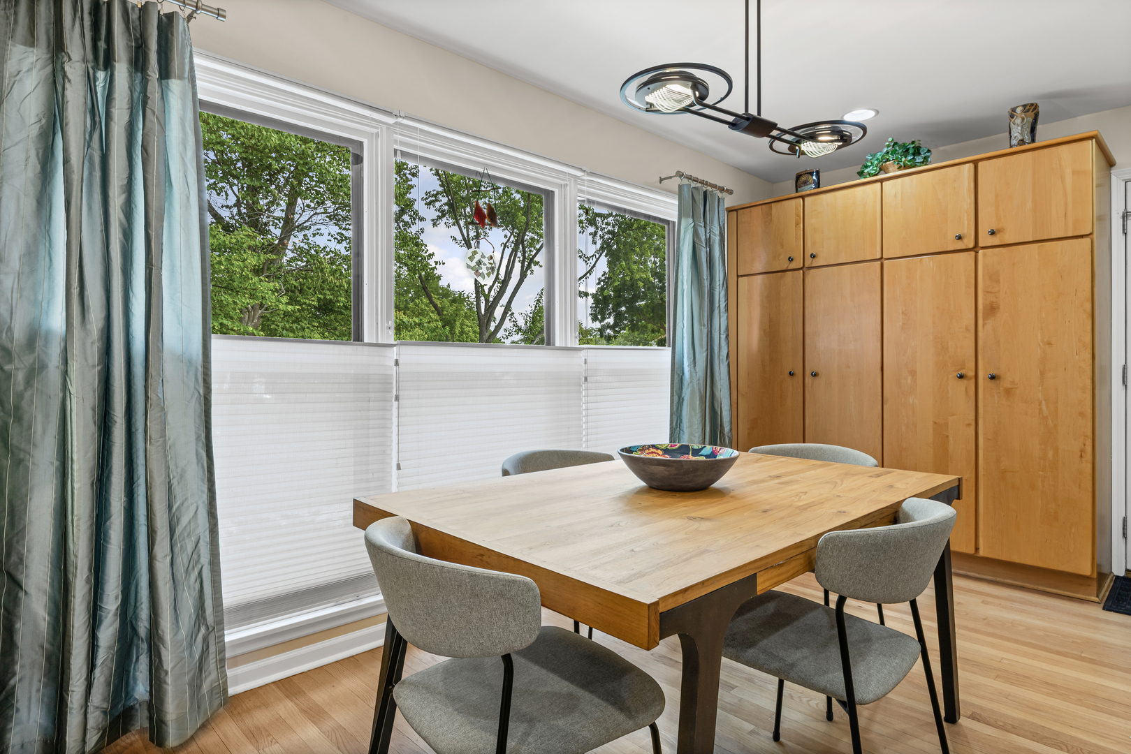 290 Cold Spring Road Barrington, IL 60010 - Photo 12 of 35 a view of a dining room with furniture window and wooden floor