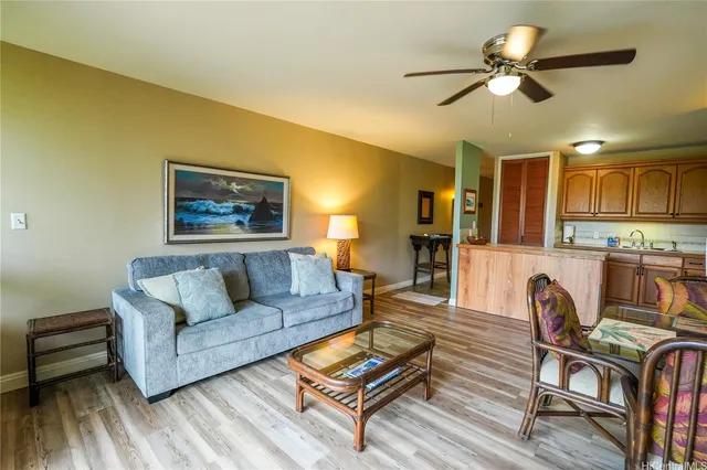 a balcony with table and chairs