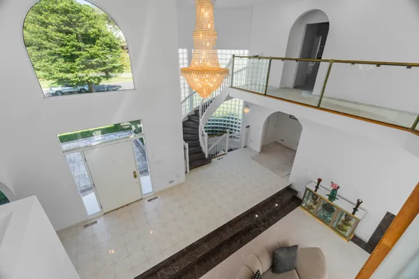 a view of living room with furniture and a window