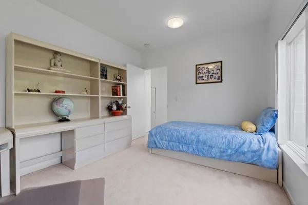 a view of a hallway with staircase