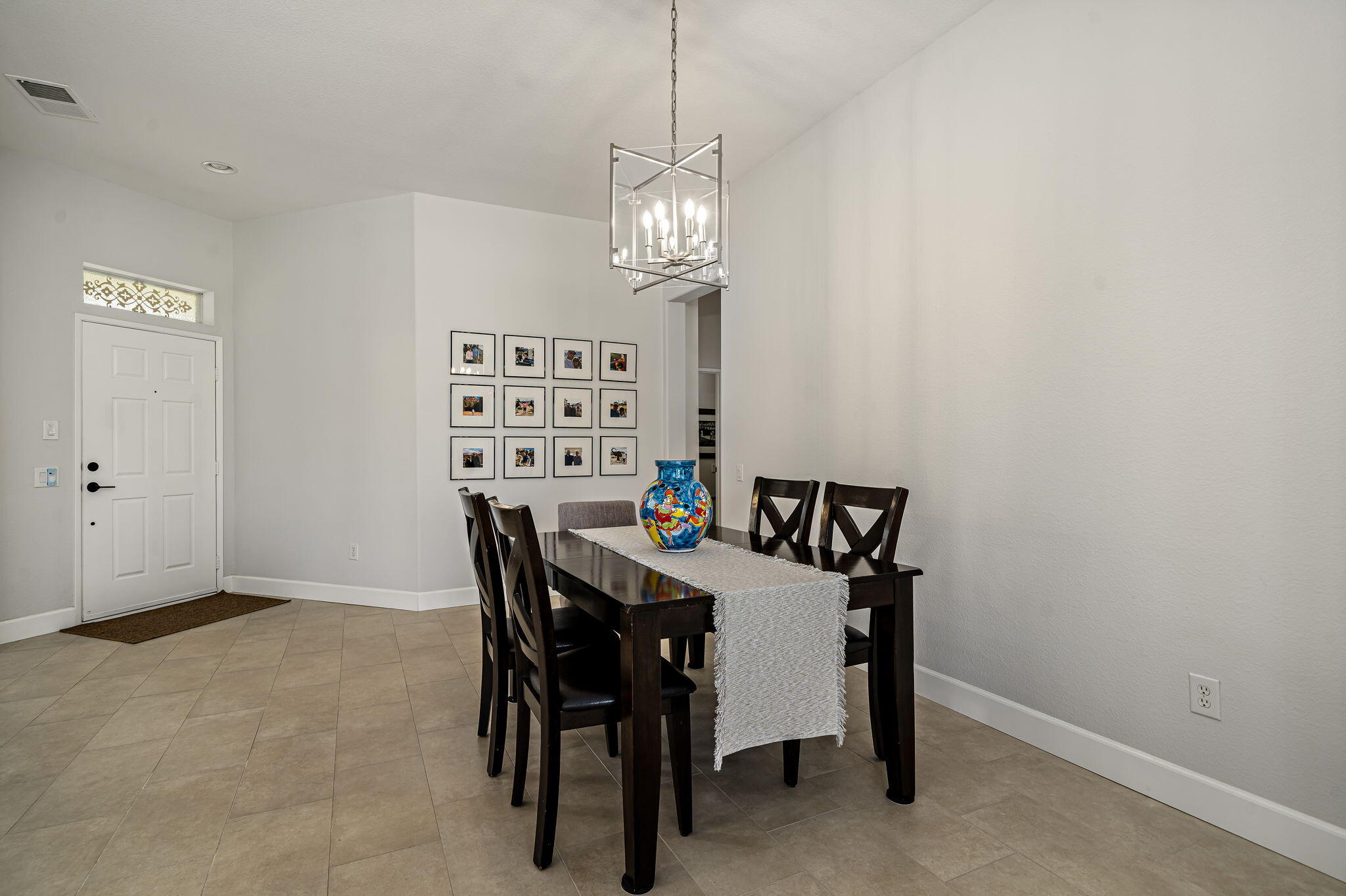 80418 Portobello Drive Indio, CA 92201 - Photo 7 of 51 a view of a dining room with furniture