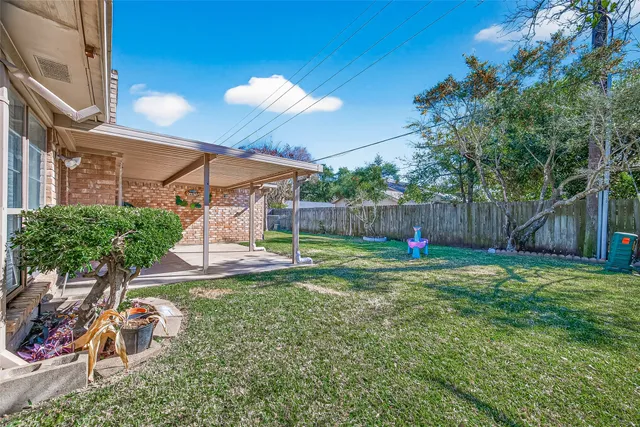 a view of a backyard with a slide