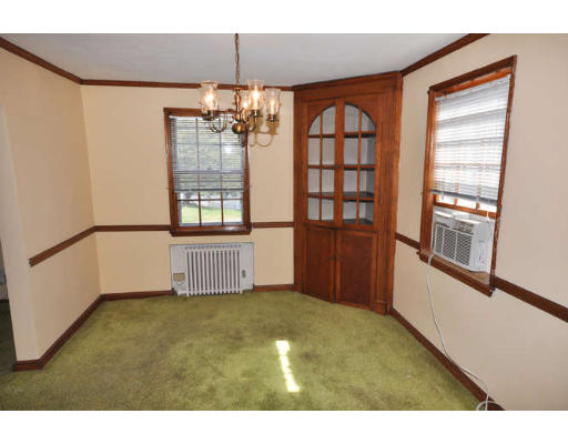 1 Braeburn Road Boston, MA 02136 - Photo 8 of 16 a view of an empty room with a window