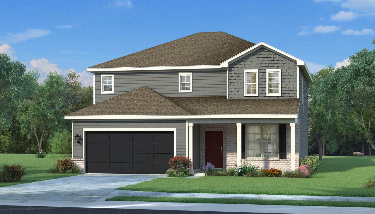 2038 Maplewood, Unit 12 Decatur, GA 30035 - Photo 1 of 1 a front view of a house with garden