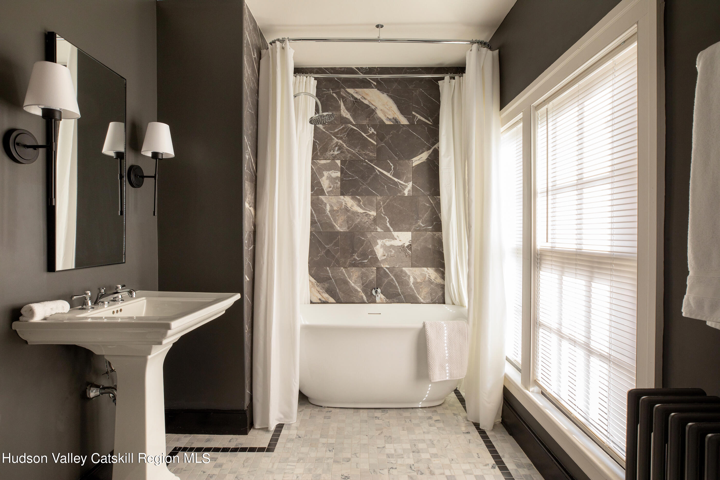 164 River Street Middleburgh, NY 12122 - Photo 22 of 48 a bathroom with a sink and a mirror