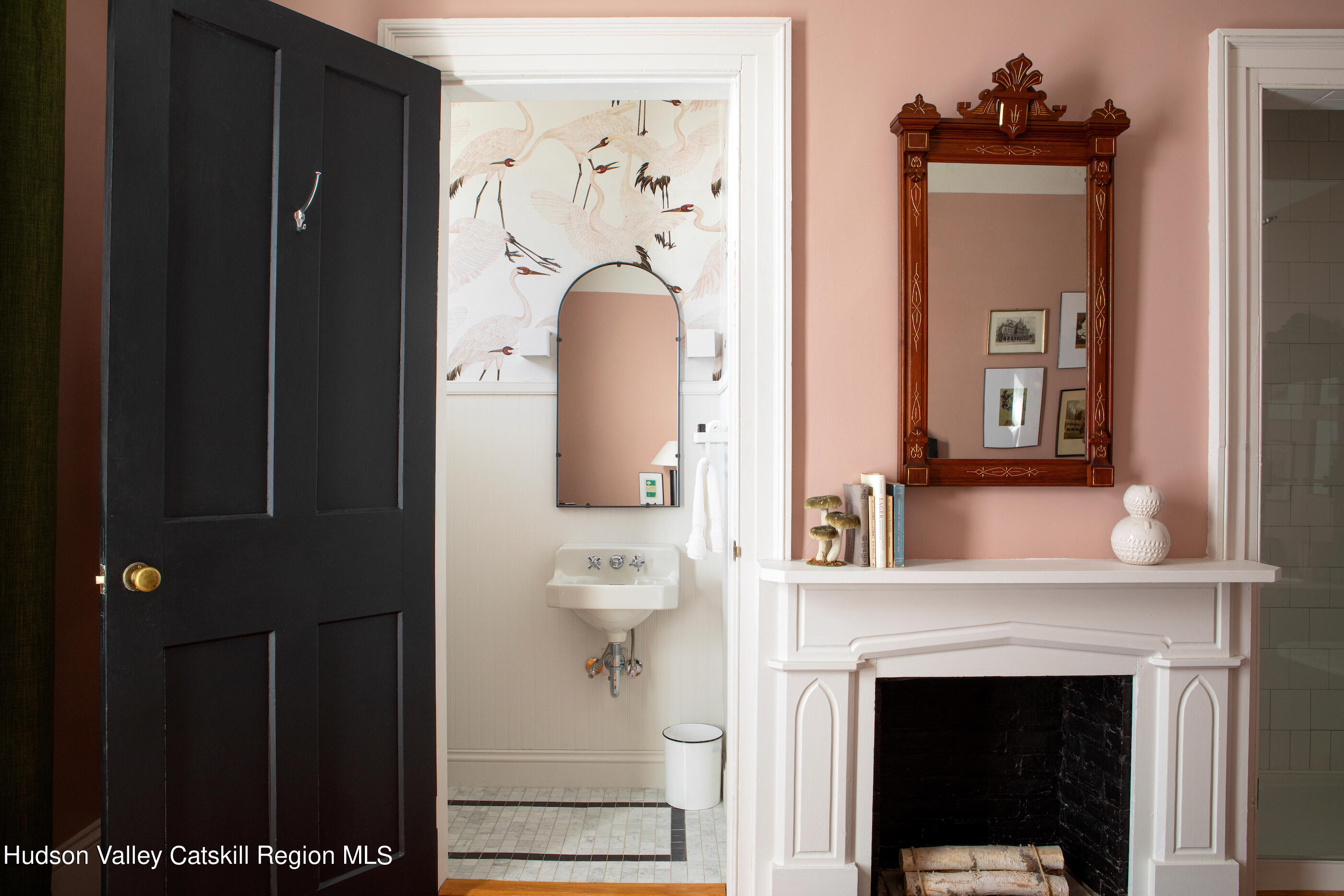 164 River Street Middleburgh, NY 12122 - Photo 24 of 48 a view of a hallway with wooden floor and a fireplace