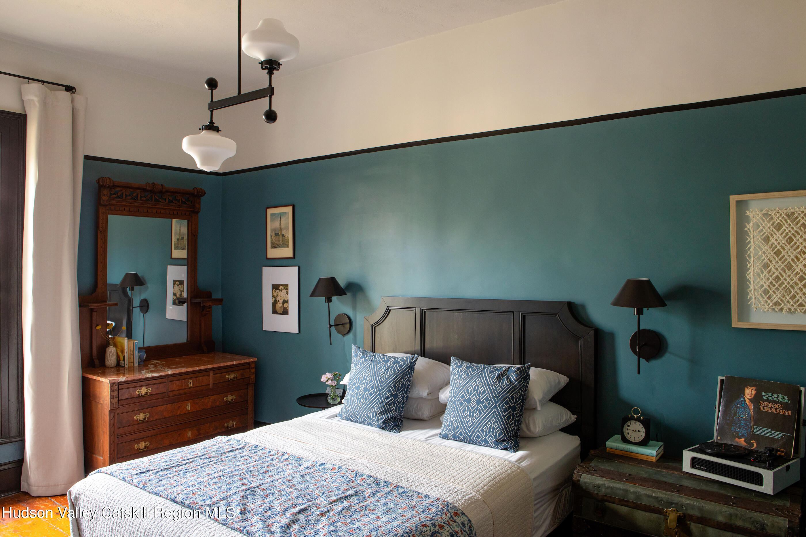 164 River Street Middleburgh, NY 12122 - Photo 25 of 48 a bedroom with a bed and a television in it