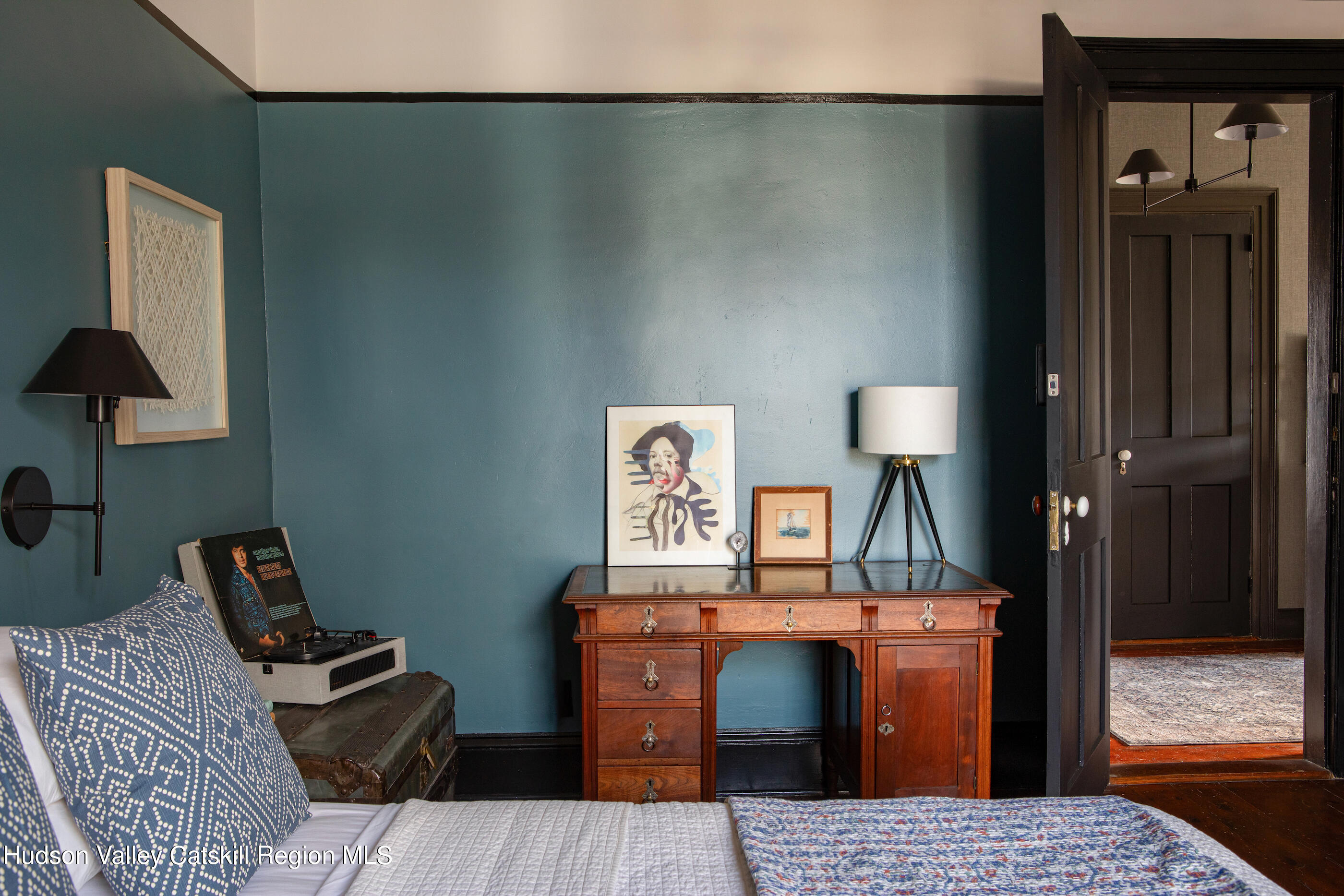 164 River Street Middleburgh, NY 12122 - Photo 26 of 48 a bedroom with a bed and a lamp on table