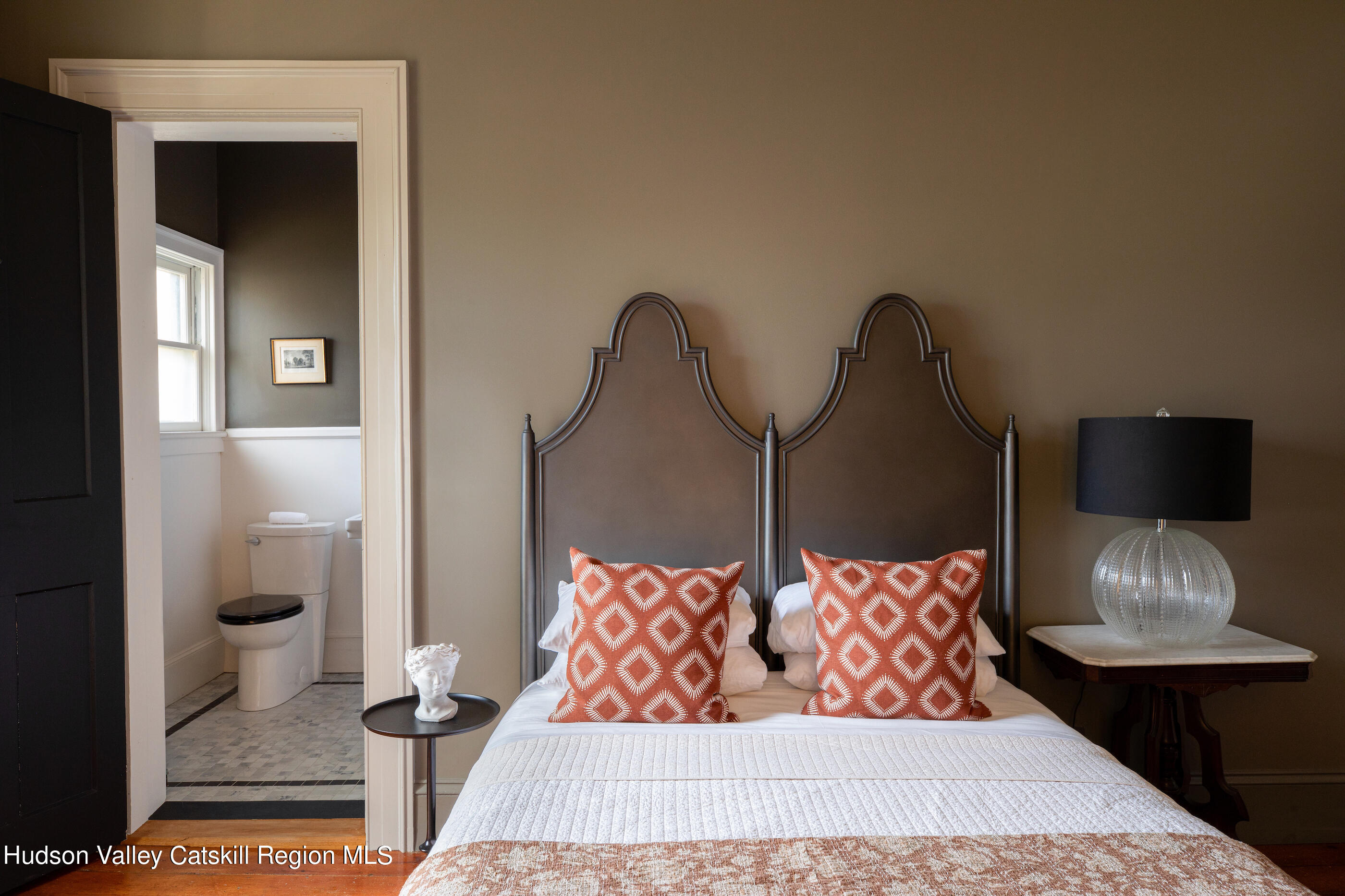 164 River Street Middleburgh, NY 12122 - Photo 29 of 48 a living room with furniture and a lamp