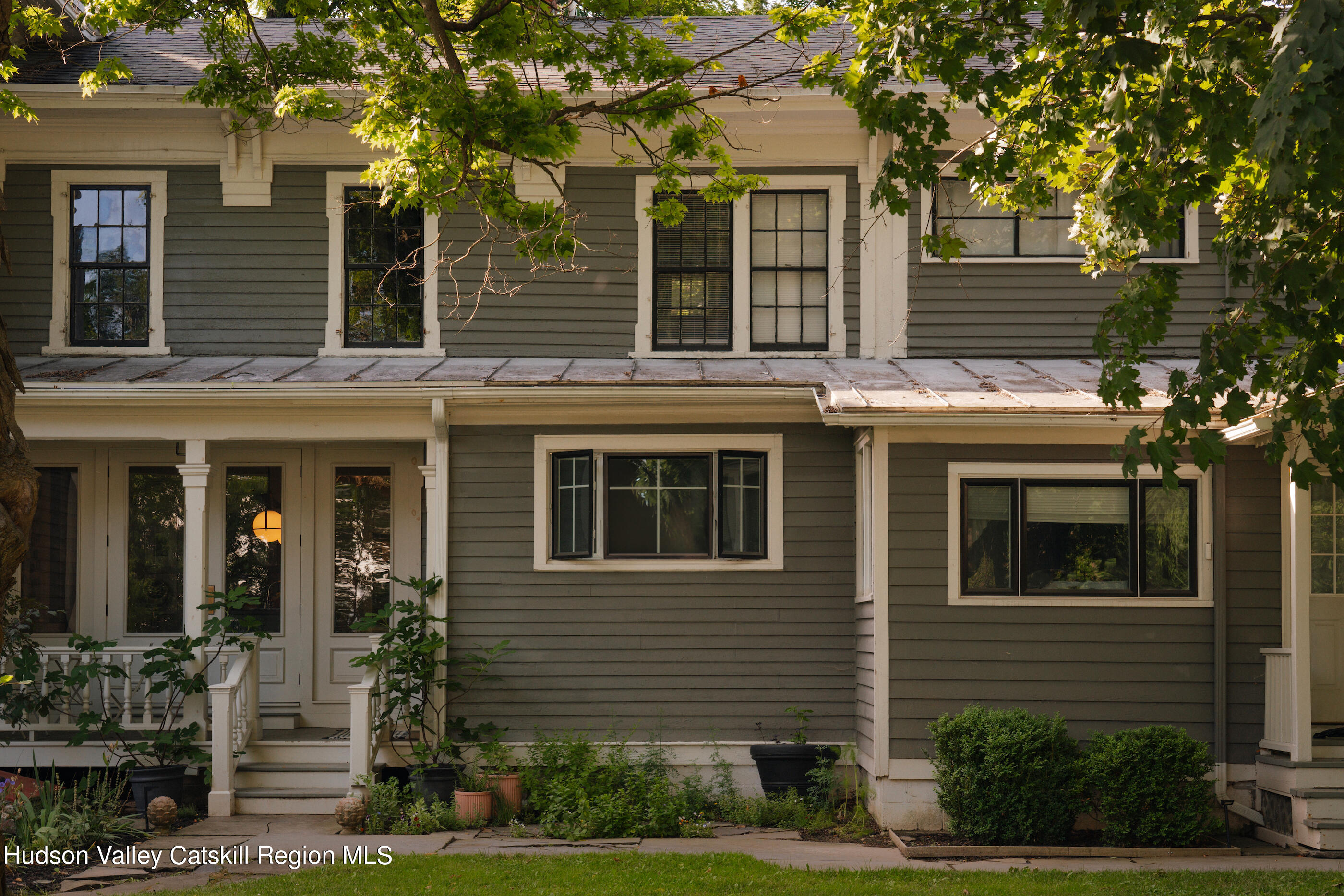 164 River Street Middleburgh, NY 12122 - Photo 37 of 48 a front view of a house with a yard