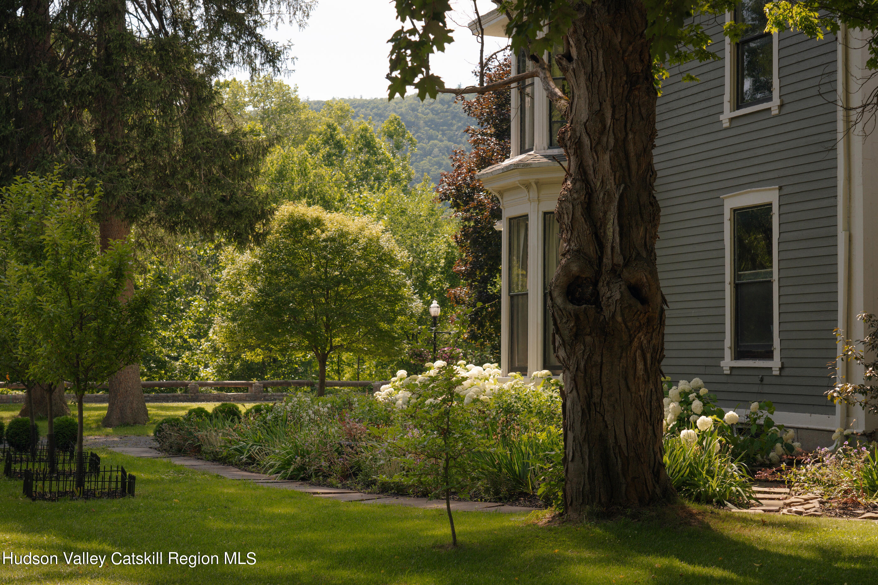 164 River Street Middleburgh, NY 12122 - Photo 39 of 48 a view of a house with a yard