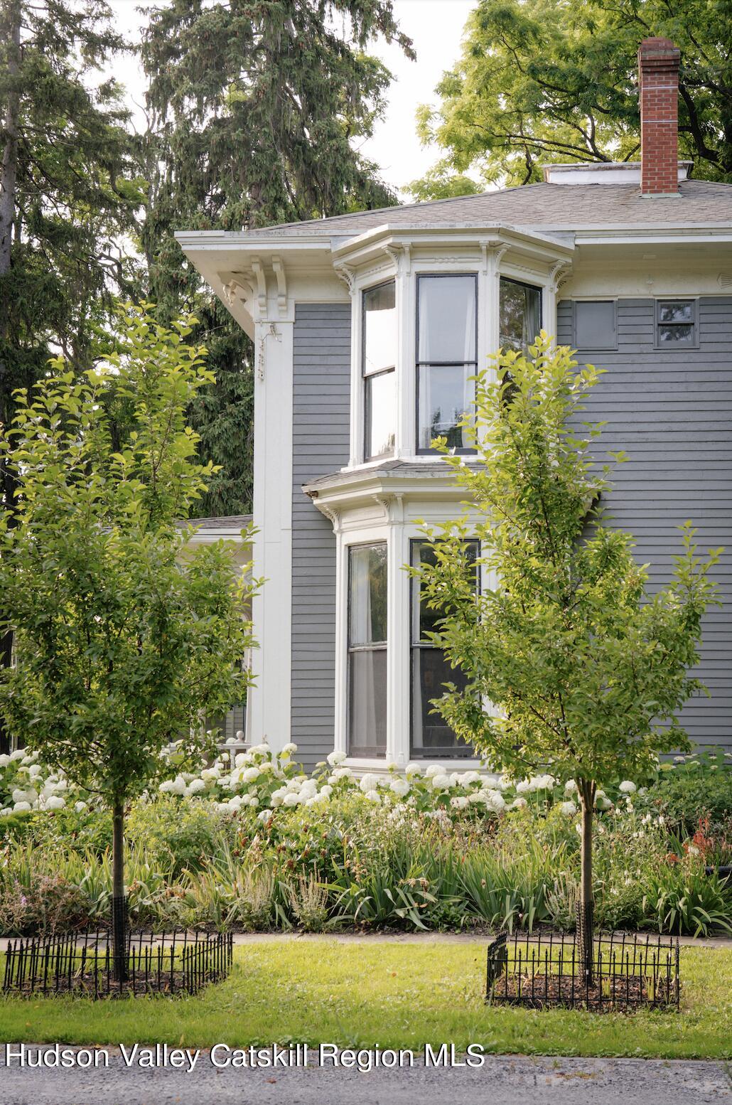 164 River Street Middleburgh, NY 12122 - Photo 40 of 48 front view of a house with a yard