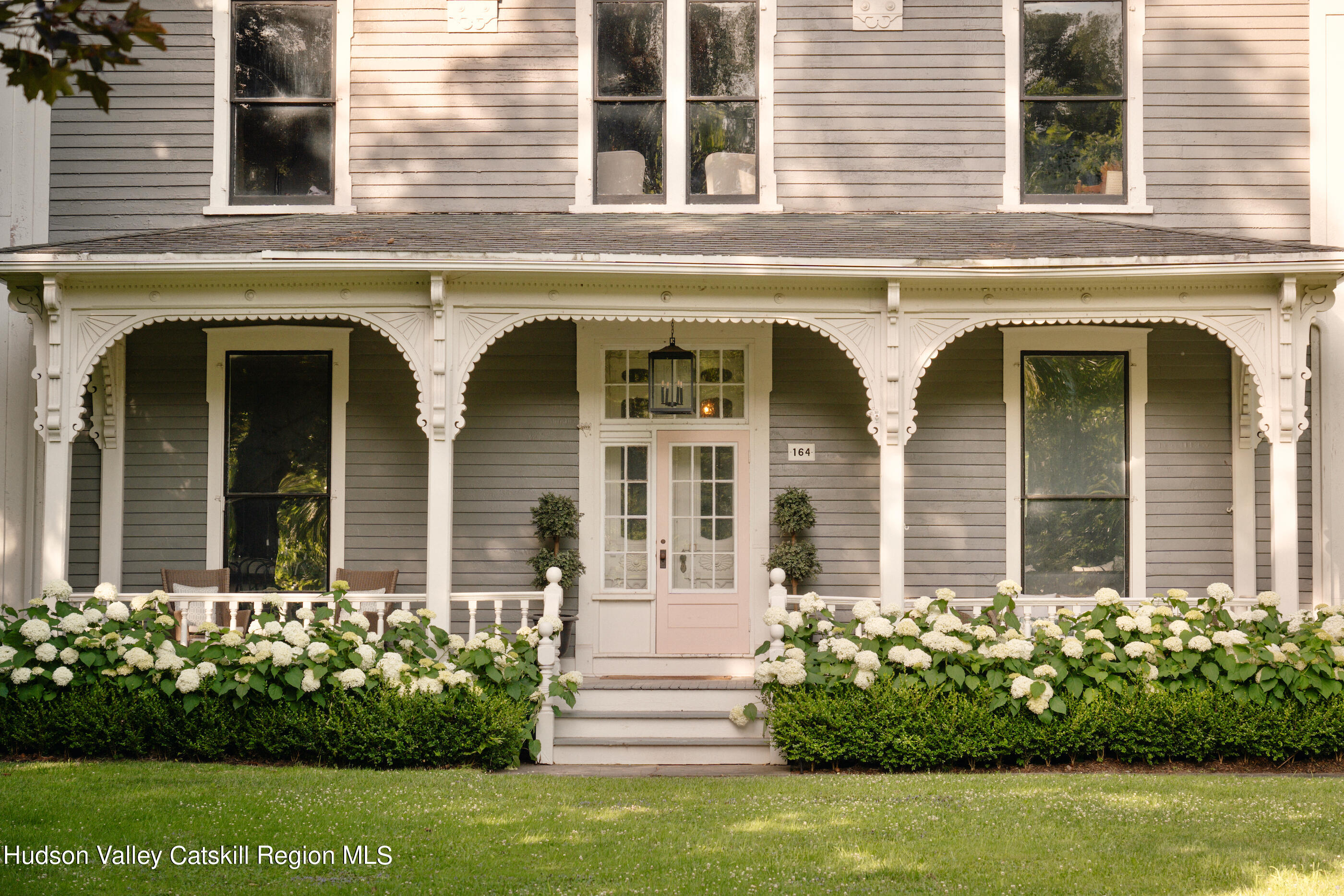 164 River Street Middleburgh, NY 12122 - Photo 8 of 48 front view of a house with potted plants