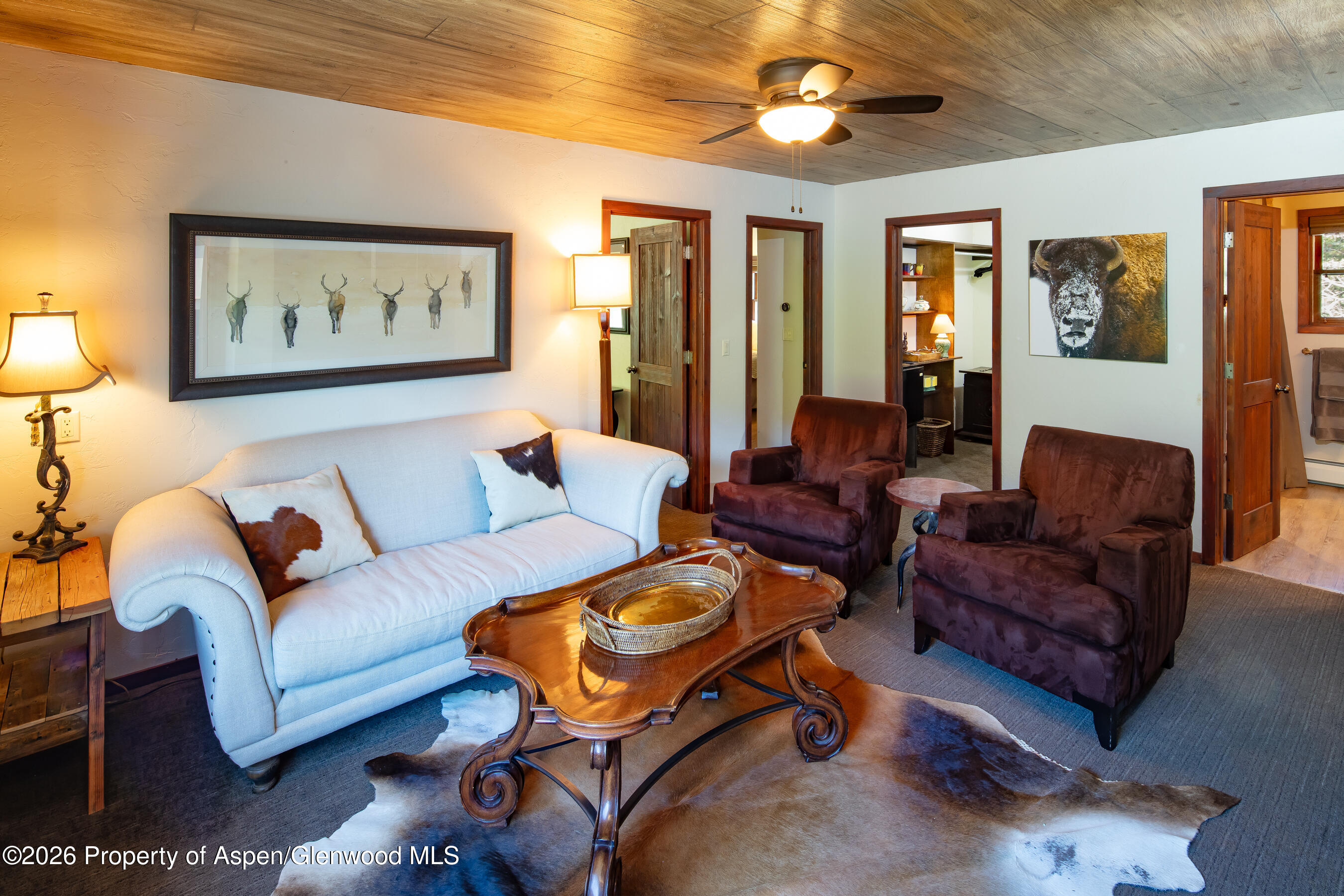 294 Ruedi Creek Road Basalt, CO 81621 - Photo 14 of 27 a living room with furniture and a glass door