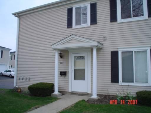 600 East Old Willow Road, Unit 181D Prospect Heights, IL 60070 - Photo 1 of 1 a front view of a house with a garden