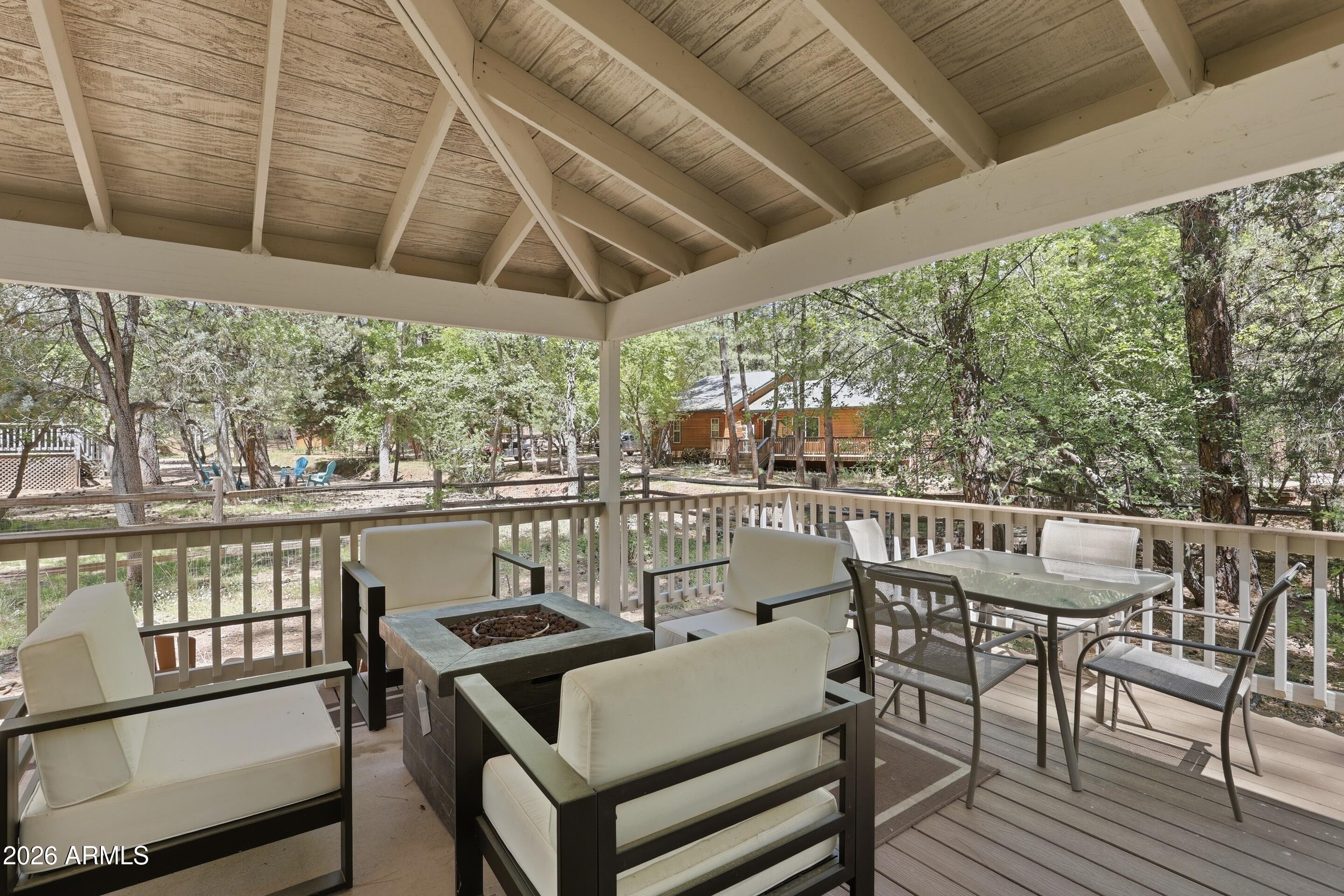6322 Sharyn Road Pine, AZ 85544 - Photo 13 of 37 a view of a balcony with furniture
