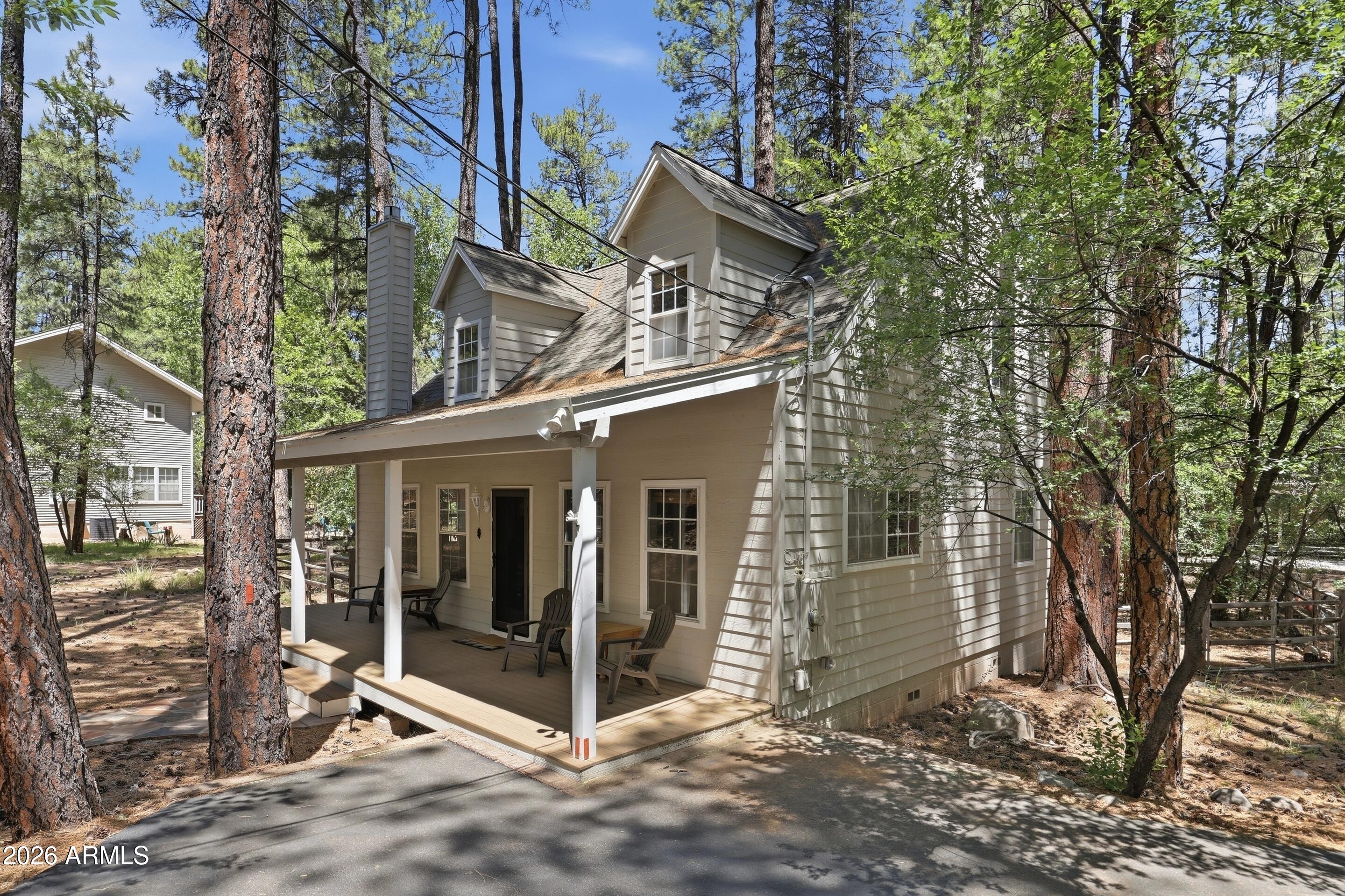 6322 Sharyn Road Pine, AZ 85544 - Photo 2 of 37 a view of a house with a yard