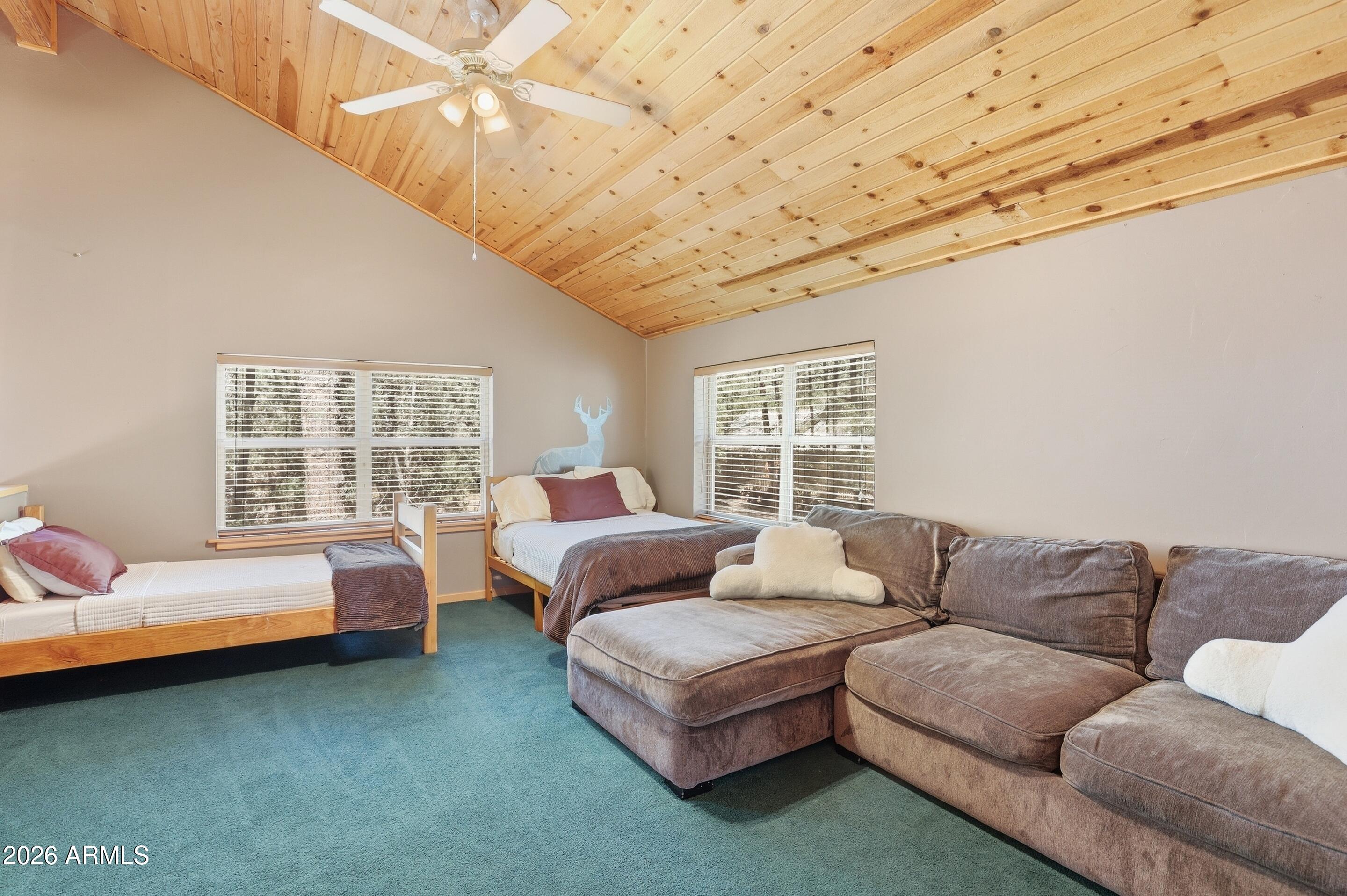 6322 Sharyn Road Pine, AZ 85544 - Photo 21 of 37 a living room with furniture and a large window