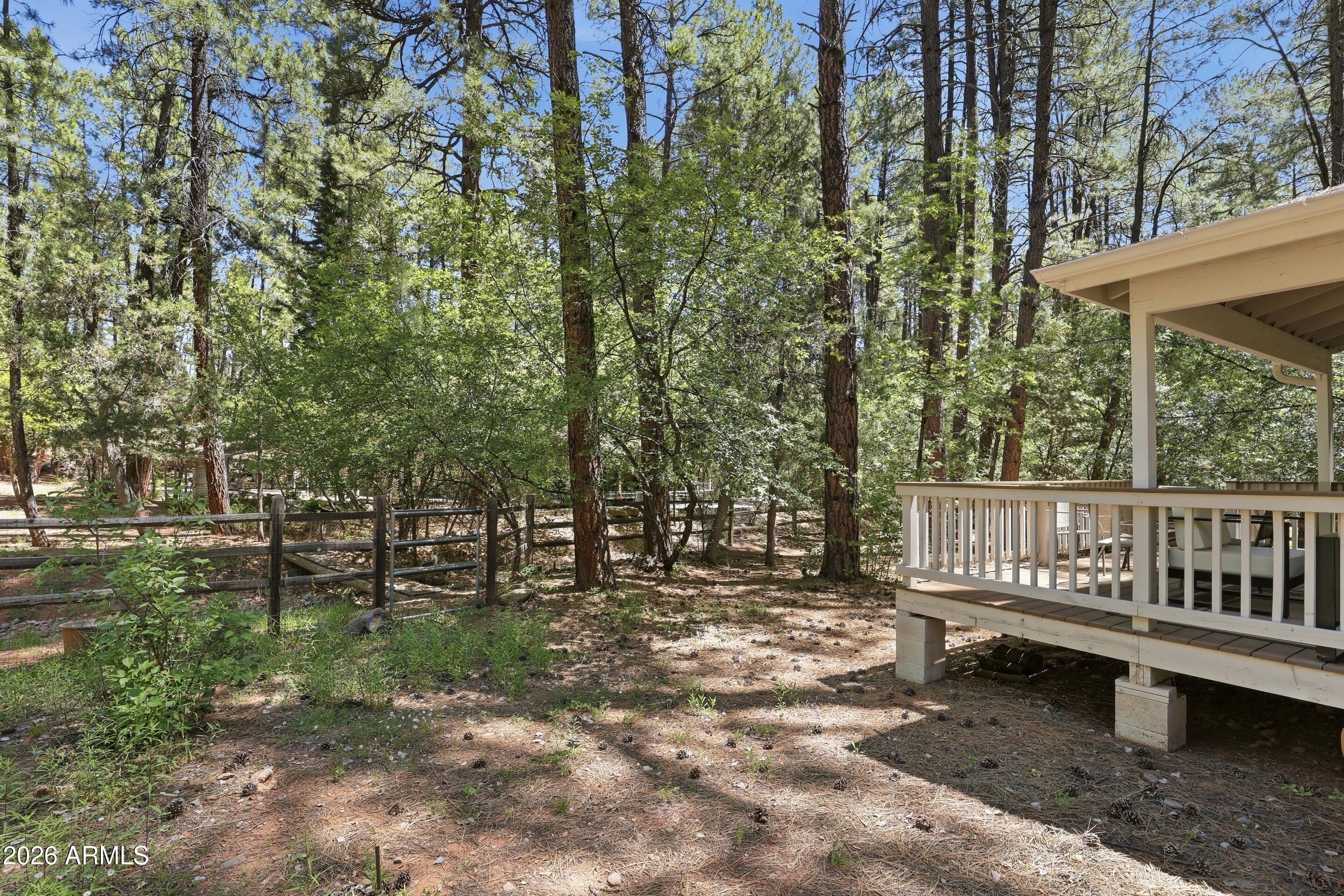 6322 Sharyn Road Pine, AZ 85544 - Photo 29 of 37 a view of a bench in a backyard