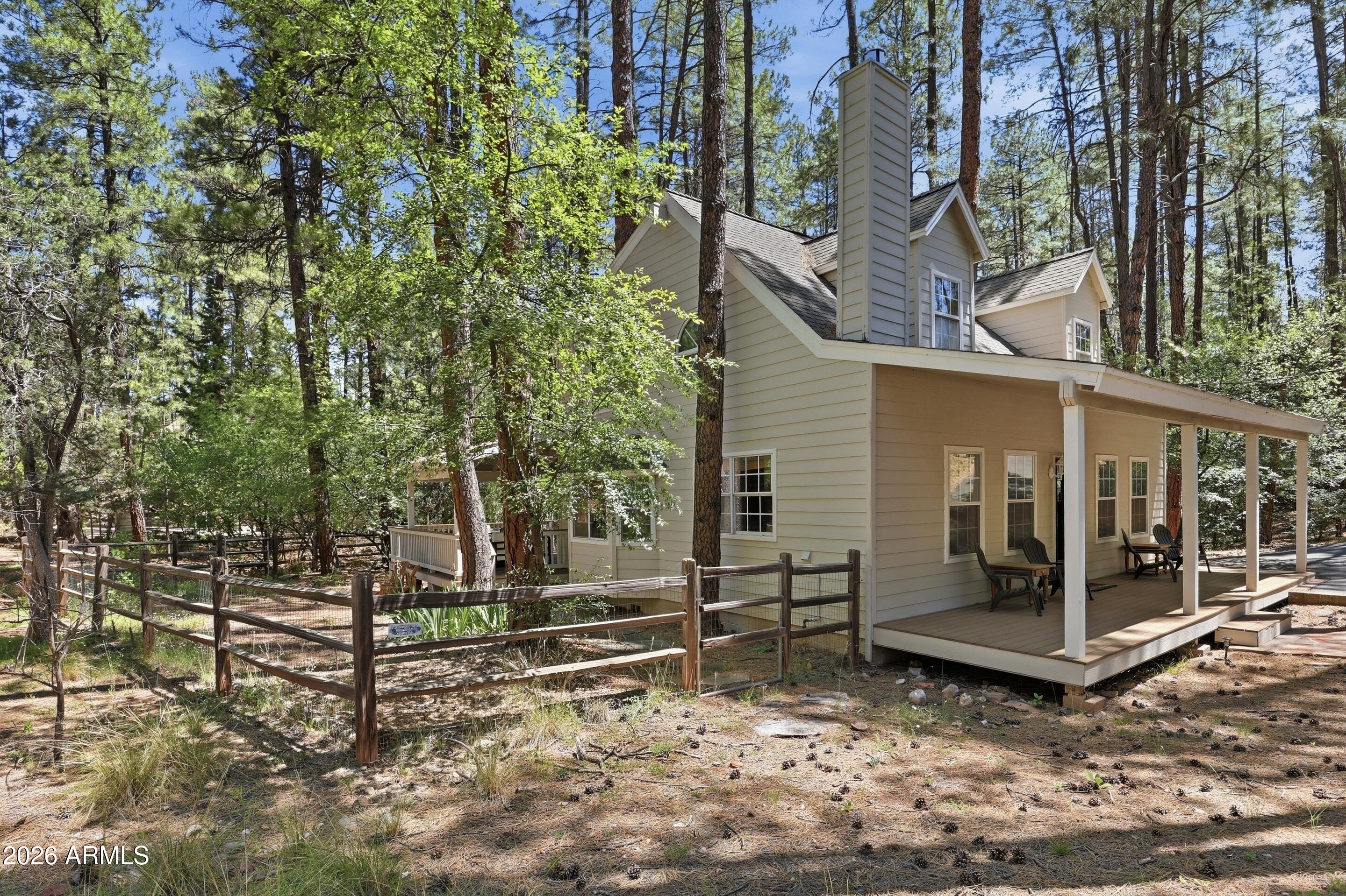 6322 Sharyn Road Pine, AZ 85544 - Photo 30 of 37 a view of a house with backyard