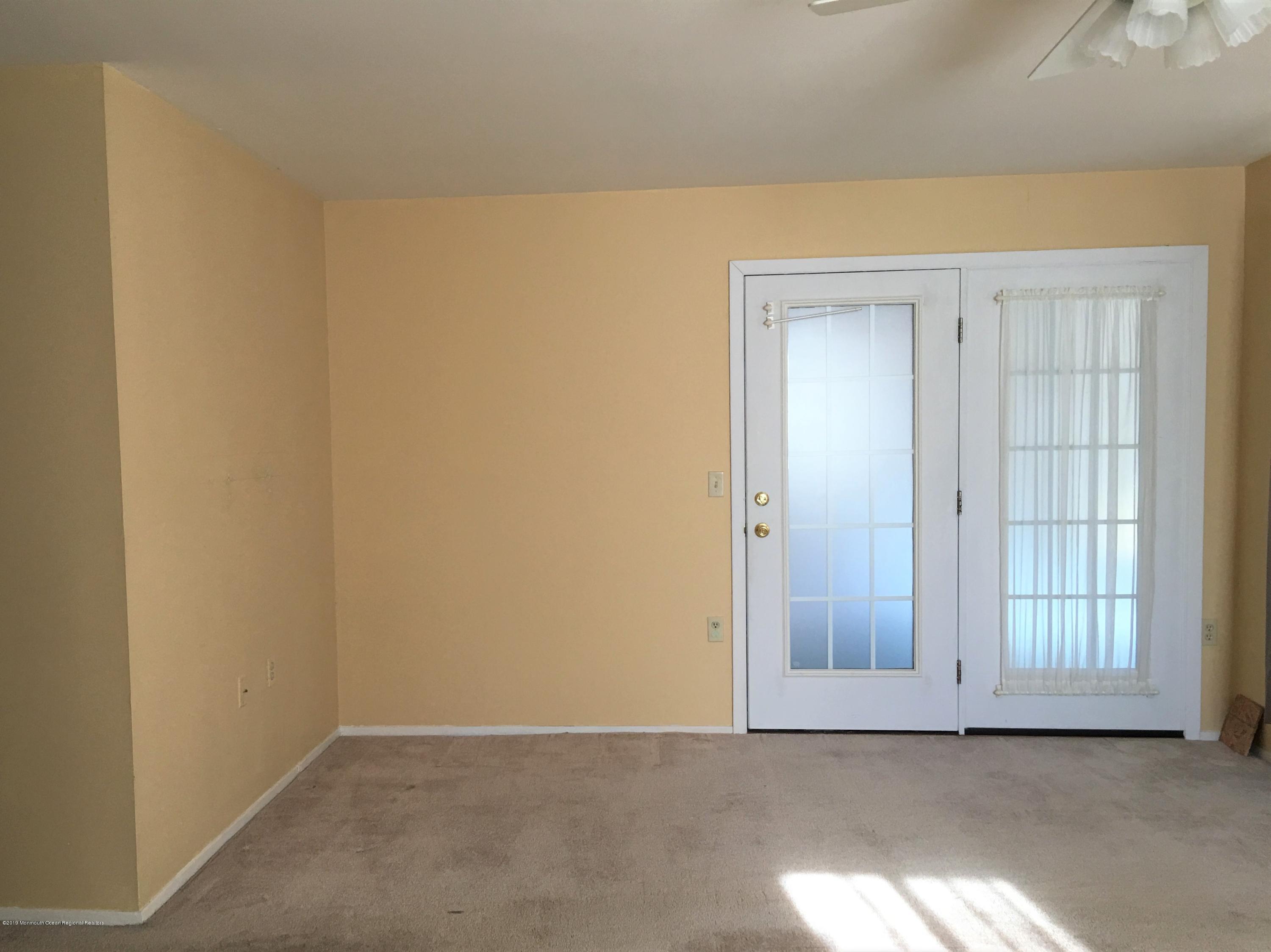 34 Berkshire Road, Unit 65 Whiting, NJ 08759 - Photo 15 of 16 french door in master leading to 3 seaso