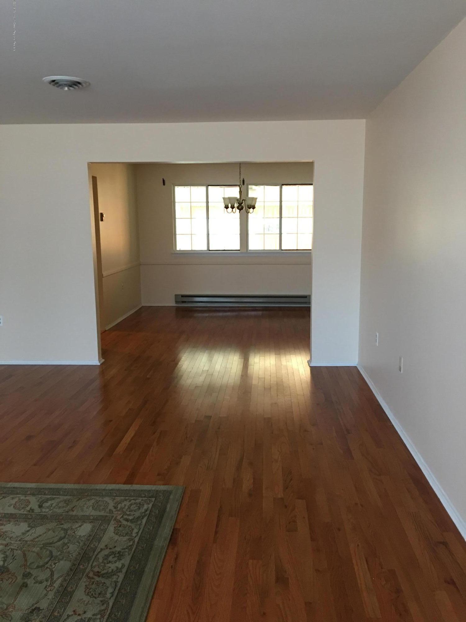 34 Berkshire Road, Unit 65 Whiting, NJ 08759 - Photo 6 of 16 living into dining room